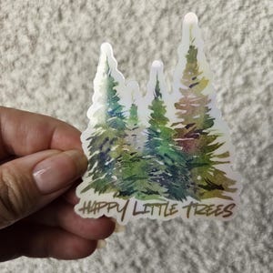 Happy Little Trees: doorzichtige vinylsticker met holografische afwerking