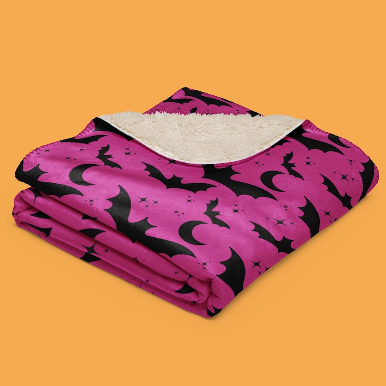 Bats In The Night Sherpa Fleece Blanket. Color: Spooky Sorbet. Halloween Home Decor. Available from HappyGlowLuckyCo.