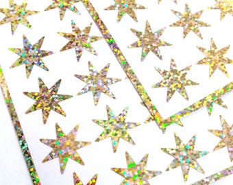 Gold Starburst Stickers, set of 48 sparkly star stickers for ornaments, journals, planners, gift tags and craft projects.