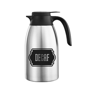 May include: A stainless steel thermal carafe with a black lid and handle. The carafe has a black label with the word "DECAF" in white lettering.
