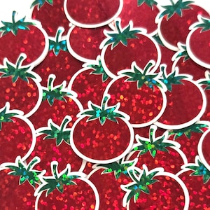 May include: A collection of red, glittery tomato-shaped embellishments with white outlines and green, iridescent leaves. These decorative die-cuts are scattered across the image, creating a playful and festive appearance.