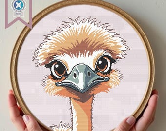 May include: A close-up of an embroidered image of an emu with large brown eyes, a long neck, and a light brown and white patterned head. The emu is looking directly at the viewer.