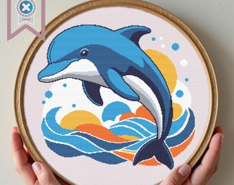 May include: A blue dolphin jumps out of the water, surrounded by stylized waves in shades of blue, orange, and yellow. The dolphin is facing left and has a white belly.