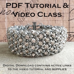 May include: A silver-toned bracelet with clear, sparkling crystals. The bracelet is made of interconnected metal links, forming a wide band. Text at the top reads "PDF Tutorial & Video Class." The bottom text says "Digital Download contains active links to the video tutorial and supplies."