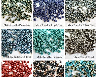 May include: Assortment of 8/0 Miyuki seed beads in various matte colors, including antique rose gold, brick red, khaki iris, patina iris, royal blue, silver gray, steel blue, turquoise, nickel plated, opaque terra cotta, black capri, blue turquoise vitrail, green turquoise capri, vitrail, and white labrador.