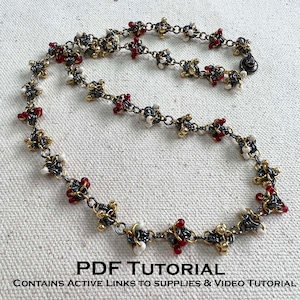May include: A silver and gold chain necklace with red and white beads. The necklace is made of small, intricate metal links.  The chain is approximately 18 inches long.  PDF TUTORIAL CONTAINS ACTIVE LINKS TO SUPPLIES & VIDEO TUTORIAL