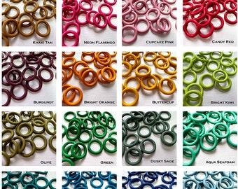 May include: Assortment of 15mm EPDM rubber O-rings in various colors, including black, white, charcoal grey, dark chocolate, khaki tan, neon flamingo, cupcake pink, candy red, burgundy, bright orange, buttercup, bright kiwi, olive, green, dusky sage, aqua seafoam, teal, blue wave, celestial blue, powder blue, navy, indigo blueberry, purple-licious, and amethyst wine.
