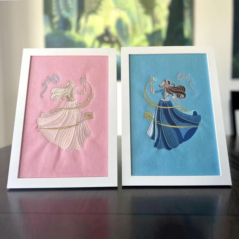 2000s nostalgia wall decor with girlypop inspired princess and pauper embroidery in a white frame.