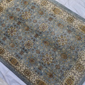Hand-Knotted Afghan Wool Rug: Soft Green Tribal Design, 9.9 x 13.11 ft