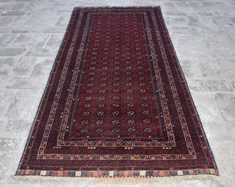 アフガニスタン産ボハラランナーラグ、手織りレッドウールラグ（4.11