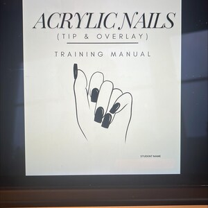 May include: A black and white illustration of a hand with acrylic nails. The text "ACRYLIC NAILS (TIP & OVERLAY) TRAINING MANUAL" is at the top of the page. The text "STUDENT NAME" is at the bottom of the page.