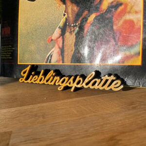 Lieblingsplatte elegant vinylställ, skivställ i glänsande metall eller vit, klassiskt svart albumfodral med konturdesign, omslagsställ