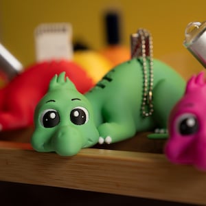 Niedlicher bunter Micro Mini SD-Kartenhalter, spielerischer praktischer Dinosaurier-Datenorganisator, lustiges Fotozubehör, kreative Speicher für USB-Sticks