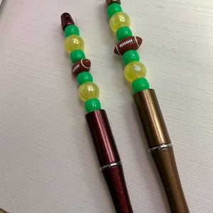 Football themed pens