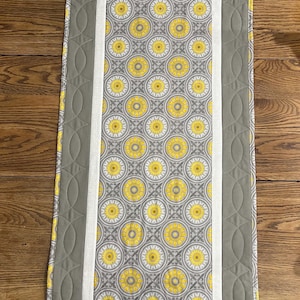Golden Wrap Quilted Table Topper NCU0NTD263