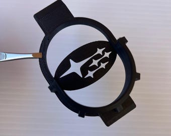 Soporte para tapa de combustible de Subaru: compatible con todos los modelos
