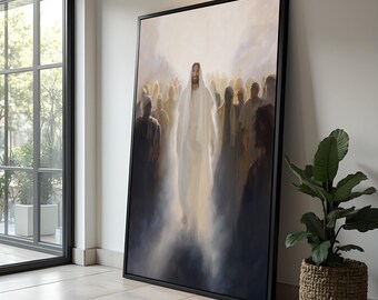 Könnte beinhalten: Ein gerahmter Leinwandkunstdruck zeigt eine Figur in weißen Gewändern, umgeben von einer Menschenmenge, gebadet in einem sanften, ätherischen Licht. Das Kunstwerk wird in einem modernen Innenraum ausgestellt und lehnt an einer weißen Wand.