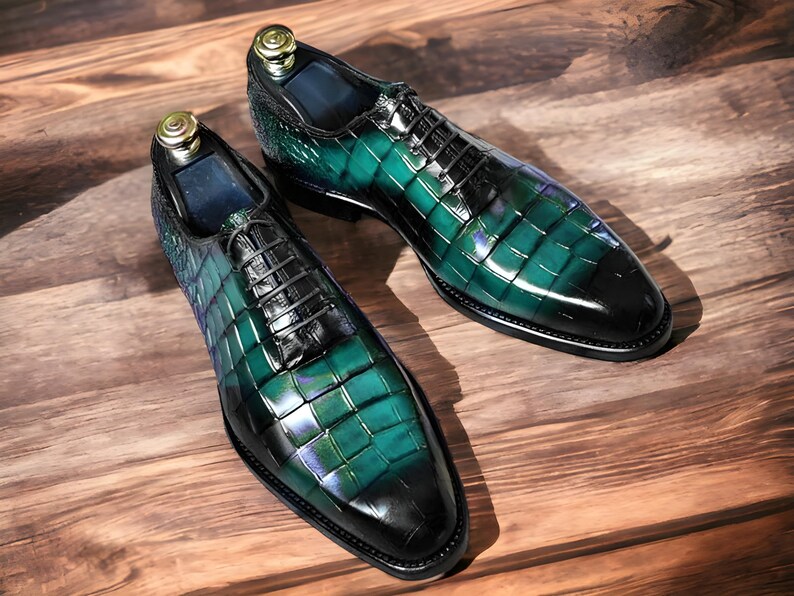 Handmade men's  alligator leather Oxford shoes featuring an exotic textured finish, lace-up closure, and a sleek silhouette for a luxury formal look.
