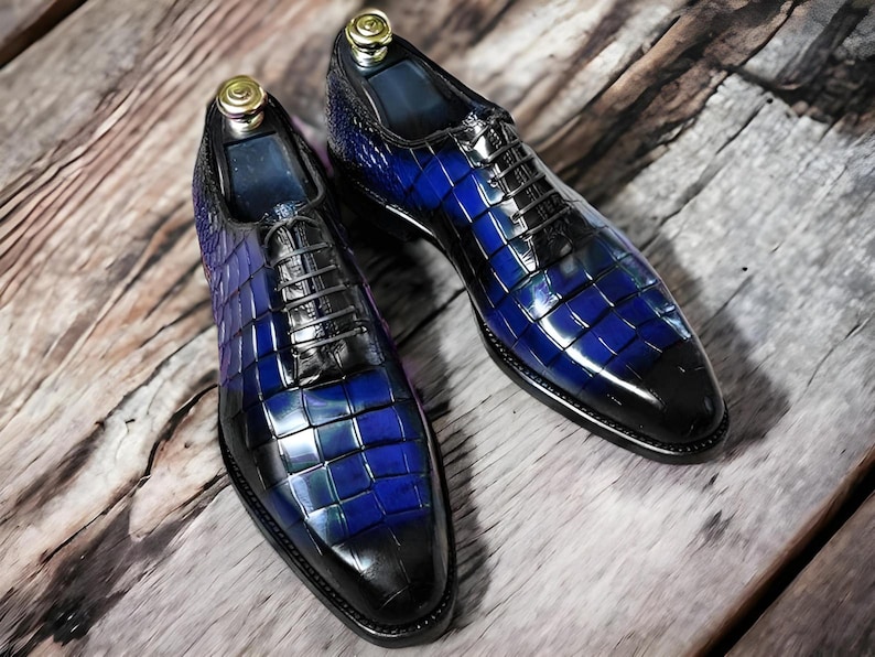 Handmade men's  alligator leather Oxford shoes featuring an exotic textured finish, lace-up closure, and a sleek silhouette for a luxury formal look.