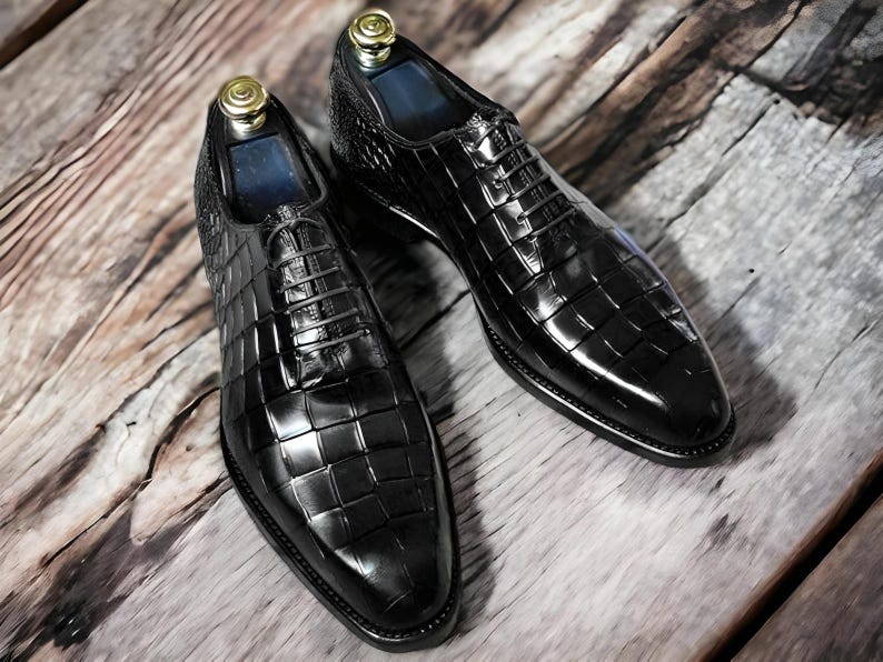 Handmade men's  alligator leather Oxford shoes featuring an exotic textured finish, lace-up closure, and a sleek silhouette for a luxury formal look.