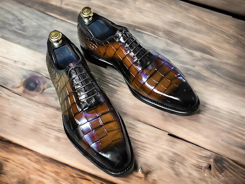 Handmade men's  alligator leather Oxford shoes featuring an exotic textured finish, lace-up closure, and a sleek silhouette for a luxury formal look.