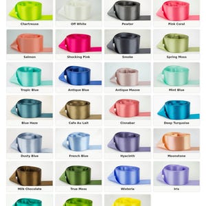 May include: A satin ribbon color chart featuring 27 distinct colors of double-faced satin ribbon, including chartreuse, off white, pewter, pink coral, salmon, shocking pink, smoke, spring moss, tropic blue, antique blue, antique mauve, mint blue, blue haze, cafe au lait, cinnabar, deep turquoise, dusty blue, french blue, hyacinth, moonstone, milk chocolate, true moss, wisteria, iris, jade, leaf green, and lemon yellow.