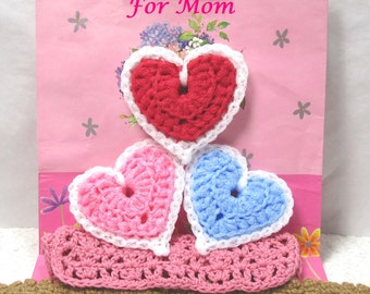 Scrubbers, scrubbie, mom, hearts, red, blue, pink, scour pads, home cleaning aid, scratch resistant, sturdy. Mother's Day 3-pack.