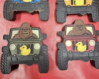 Bigfoot driving jeep chocolate