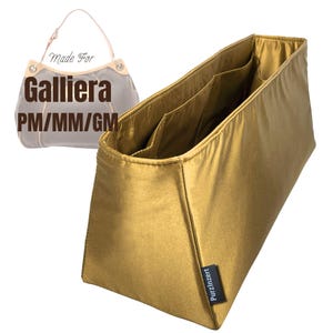 May include: A gold-coloured fabric handbag organiser insert with multiple interior pockets and a small black tag labelled PurzInzert. In the background, a graphic shows a handbag with the text Made For Galliera PM/MM/GM in dark brown letters.