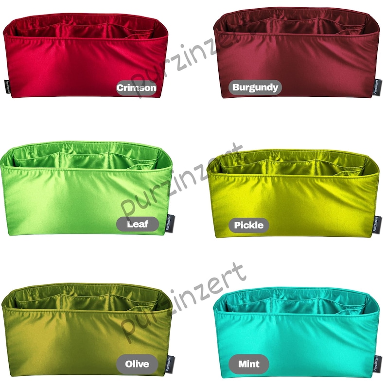 May include: A collection of colorful bag organizers in various shades, including crimson, burgundy, leaf green, pickle green, olive, and mint. Each organizer has multiple compartments for storage and organization.