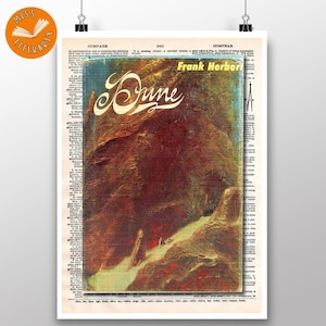 May include: A print of the book cover for "Dune" by Frank Herbert, set against a vintage dictionary page. The cover art features a desert landscape in shades of brown and red, with the title in elegant script.