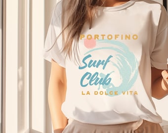 Könnte beinhalten: Weißes T-Shirt mit einer blauen und gelben Grafik, auf der "Portofino Surf Club La Dolce Vita" steht.