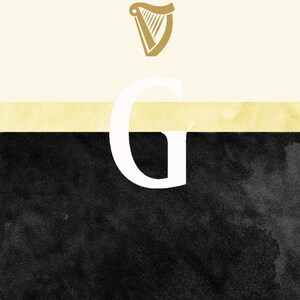 May include: A black and white graphic with a white letter G in the center. The letter G is on top of a thin yellow stripe. Above the stripe is a white background with a gold harp logo.