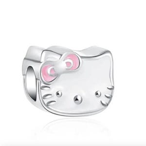 May include: A silver charm featuring a white Hello Kitty character with pink ears and a pink bow. The charm has a hole for attaching to a bracelet or necklace.