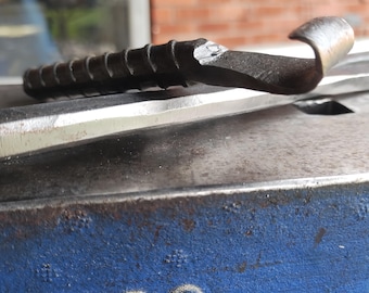 Hand forged bottle opener