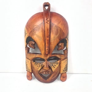 Vintage wooden wall decoration African face mask