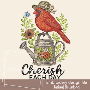 May include: An embroidery design featuring a red cardinal bird wearing a straw hat, perched on a watering can decorated with flowers. The words "Cherish Each Day" are below the watering can. The design is surrounded by green leaves and flowers.