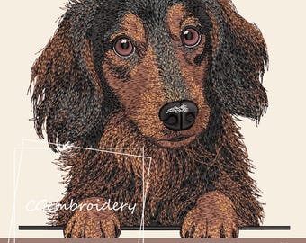 May include: An embroidered image of a Dachshund dog with brown and black fur, large eyes, and a black nose. The dog is peeking over a dark brown surface. Text in the image reads "Embroidery design file Instant Download".