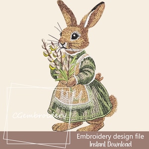 Könnte beinhalten: Stickdatei eines braunen Kaninchens, das ein grünes Kleid trägt und einen Strauß gelber Blumen hält. Das Design ist perfekt für ein Osterbastelprojekt.