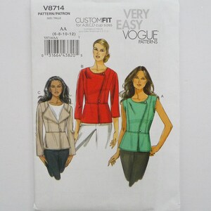 May include: Vogue Patterns sewing pattern V8714 for custom fit tops. The pattern includes illustrations of three different top styles in red, green, and beige. The pattern size is AA (6-8-10-12).