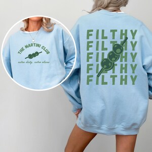 MARTINI KEYWORDS espresso martini sweatshirt
dirty martini sweatshirt
martini bachelorette
old money aesthetic
martinis and bikinis
dirty martini shirt
martini gifts
Martini shirt
Filthy martini sweatshirt
Girls trip shirt 
Girls weekend top