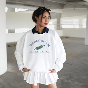 MARTINI KEYWORDS espresso martini sweatshirt
dirty martini sweatshirt
martini bachelorette
old money aesthetic
martinis and bikinis
dirty martini shirt
martini gifts
Martini shirt
Filthy martini sweatshirt
Girls trip shirt 
Girls weekend top