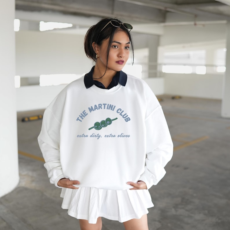MARTINI KEYWORDS espresso martini sweatshirt
dirty martini sweatshirt
martini bachelorette
old money aesthetic
martinis and bikinis
dirty martini shirt
martini gifts
Martini shirt
Filthy martini sweatshirt
Girls trip shirt 
Girls weekend top