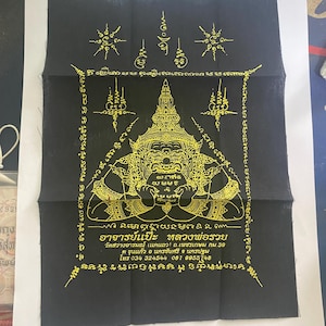 Thailändsk Rahu Om Jan Yantra-tyg: Välstånd, skydd, lycka och rikedomsamulett av Arjan Pae, från Wat Sawang Arom, Thailand