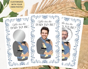 May include: Three rectangular game cards with a blue floral border and the text Who has the DAD-TO-BE? Each card features an illustration of a person carrying a baby in a carrier. One card shows a custom photo of a man, while others show scratch-off circles.