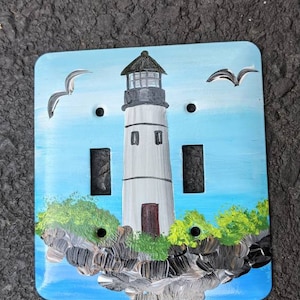 Dekorativ brytarplatta för fyrstrand