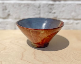 Blue and brown speckled bowl
