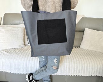 Bolsa de mano resistente al agua y duradera con correas y bolsillo