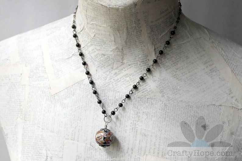 Simple Lampwork Necklace Handmade glass bead, neutral colors, rosary chain, black glass pearls antiqued silver chain, toggle clasp, simple image 3