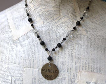Wander Necklace - Tim Holtz word tag, glass beads, black and clear, simple, short, antiqued silver